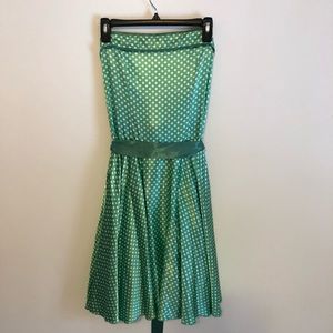 Green and white polka dot strapless dress